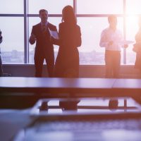 Group of Business People in Office Building Group of Business People in Office Building